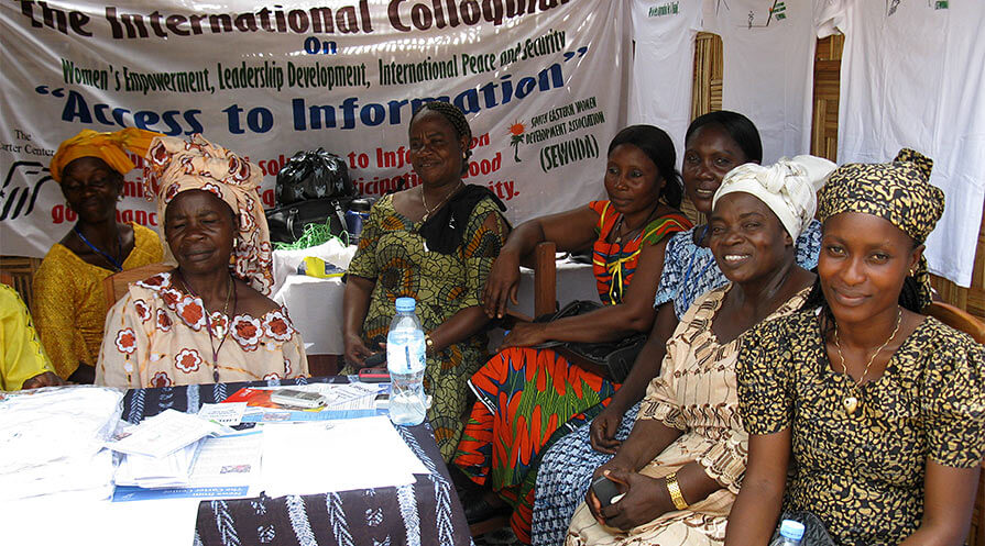 The Carter Center has partnered with Liberian civil society since 2009 to raise awareness of the country's freedom of information law and its ability to transform lives. In this photo, women gather to promote access to information at the 2009 International Colloquium on Women's Empowerment in Monrovia, Liberia.