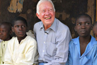 Former President Jimmy Carter visited Dauda Usman (left) and other children suffering from schistosomiasis during his Feb. 15, 2007, visit to Nasarawa North, Nigeria.