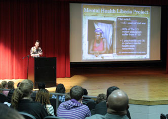 Samantha Young discusses the Center's Liberia mental health program with students at North Atlanta High School on Nov. 1.