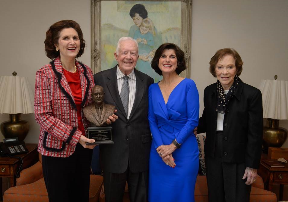 President and Mrs. Carter with former President Lyndon B. Johnson’s daughters, Lynda Johnson Robb (left) and Luci Baines Johnson (right). (Photo: The Carter Center/M. Schwartz)