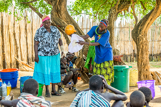 In South Sudan, a demonstration to community members on how and why to use a water filter helps prevent Guinea worm disease.