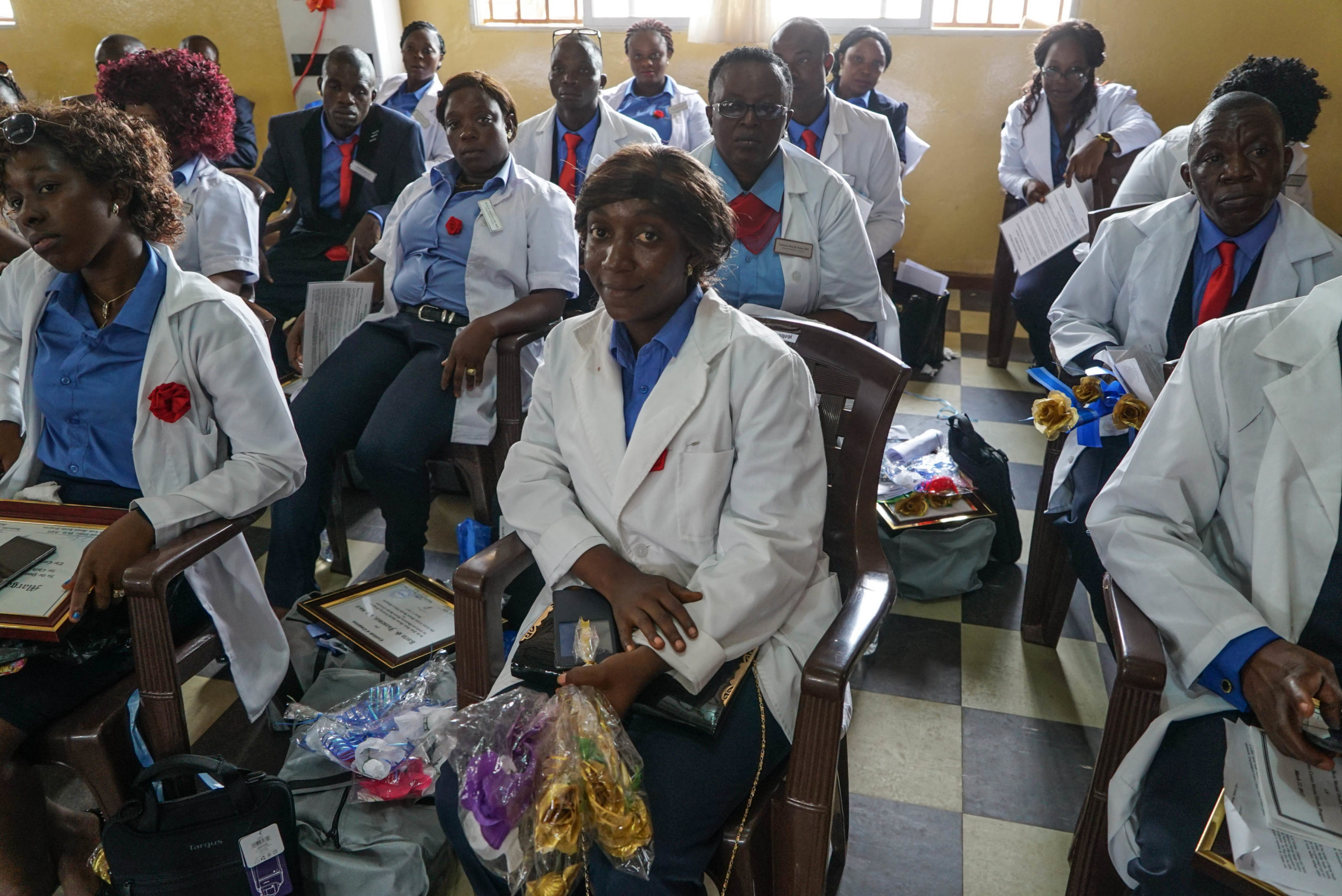 Wideshot of mental health care workers in Liberia at graduation