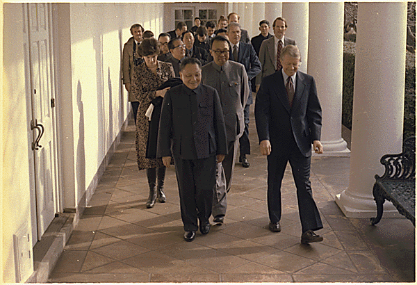 President Jimmy Carter and Vice Premier Deng Xiaoping head to the Oval Office 