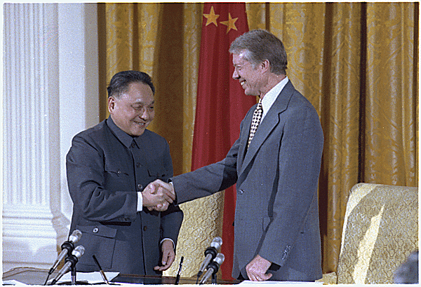 resident Carter shakes hands with Chinese Vice Premier Deng Xiaoping at a 1979 meeting.