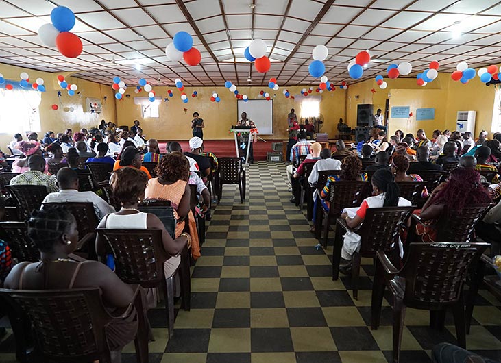  In Liberia, family and friends celebrate at a graduation ceremony for nurses newly credentialed in diagnosing and treating mental health issues. Eve Byrd was on the faculty of this Carter Center initiative in its early years and also served on the program review panel.