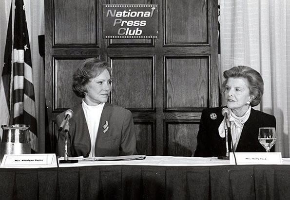 Former First Ladies Rosalynn Carter and Betty Ford joined bipartisan forces to testify in the U.S. Senate and speak at the National Press Club on March 7, 1994, calling for comprehensive mental health and substance use insurance benefits.
