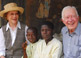 Jimmy and Rosalynn Carter visit children suffering from schistosomiasis.
