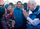 Former U.S. President Jimmy Carter greets a Nepalese boy in Kathmandu. The Carter Center monitored Nepal's Nov. 19, 2013, constituent assembly election, sending 66 observers from 31 countries to visit 336 polling centers in 31 districts.