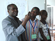 Photo of Human Rights House project staff including (from left) Boris Nzanga, Jean Mufuta, and 2008 intern Paulphine Soki.