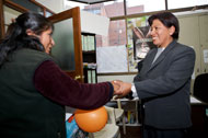 Rita Jimenez Huancollo meets with a client.